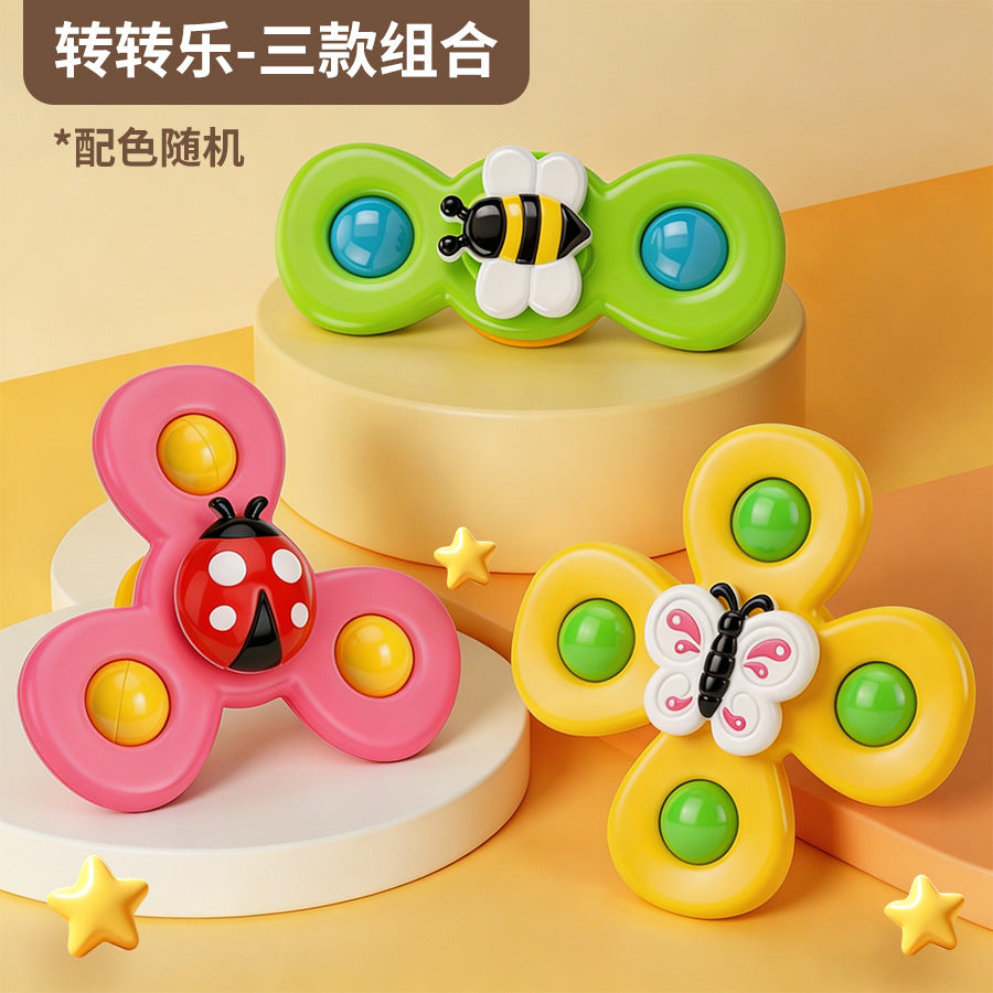 跨境儿童吸盘转转乐婴幼儿卡通手指旋转陀螺宝宝摇铃早教益智玩具