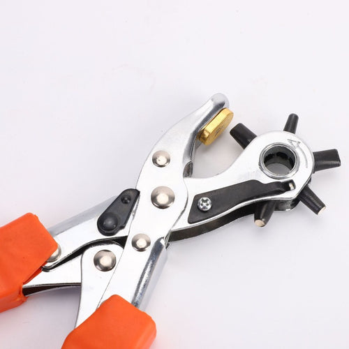 1 komad robusnih klešta za bušenje rupa u kaiševima od veštačke kože, sa rotirajućim čeličnim dizajnom i crvenom gumenom ručkom, idealna za kaiševe i projekte šivenja. Savršen poklon za ljubavnike, ova alatka je odlična za pravljenje rupa u veštačkoj koži